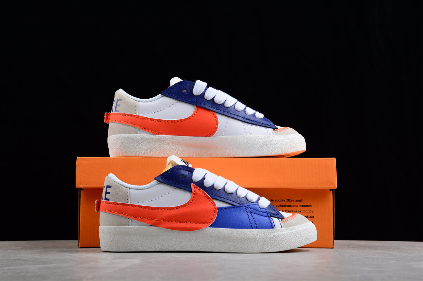 Blazer Low '77 blanco, azul y rojo