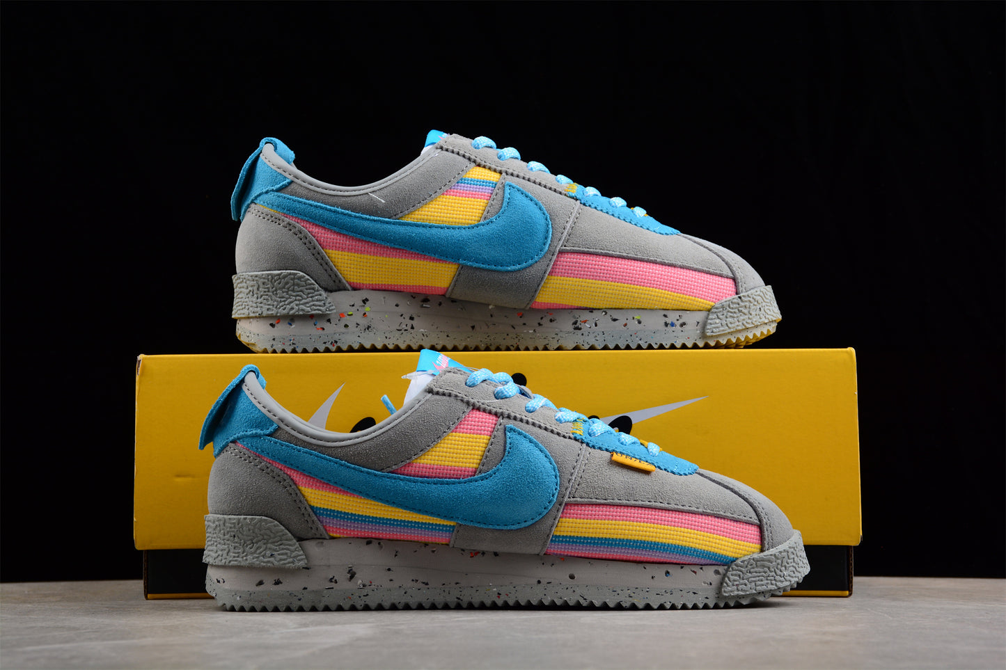 Cortez x Union LA gris, azul, amarillo y rosa
