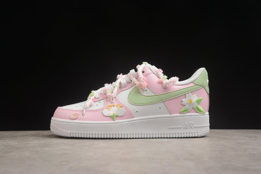 Air Force 1 Low “Cherry Blossom” rosa y verde claro