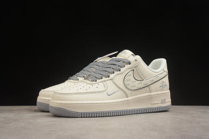 Air Force 1 Low x Stussy beige y gris