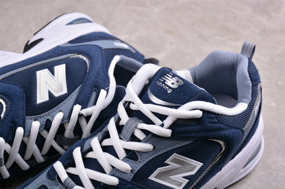 NB 530 azul marino y gris