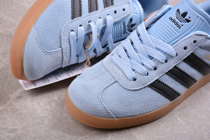 Gazelle azul cielo, negro y naranja