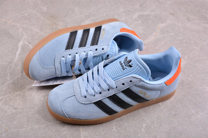 Gazelle azul cielo, negro y naranja