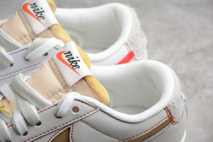 Blazer Low '77 blanco, dorado y rojo