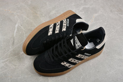 Handball Spezial negro y animal