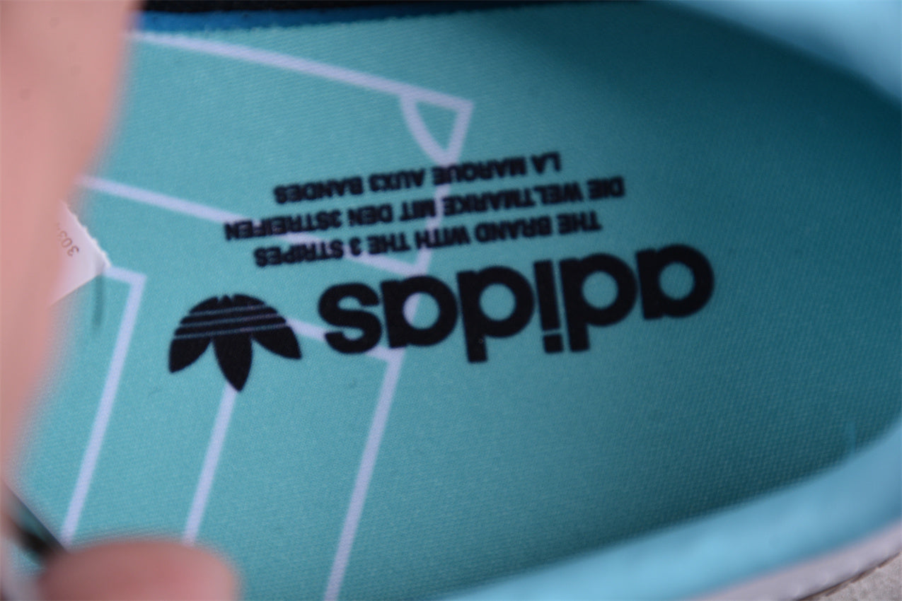 Handball Spezial gris medio, celeste claro y blanco