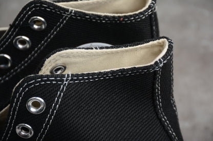 Chuck 70 Plus HI negro y blanco