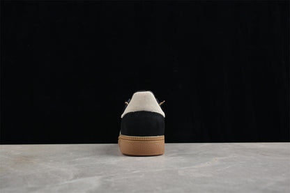 Handball Spezial negro y animal