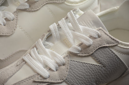 NB 327 blanco y gris