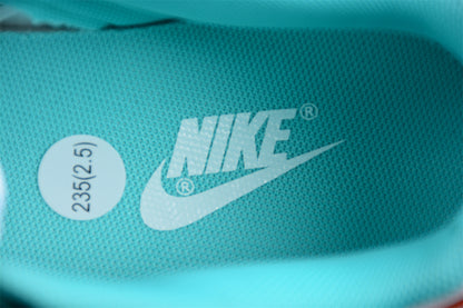 Dunk Low blanco, celeste y naranja