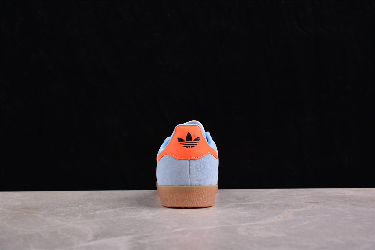 Gazelle azul cielo, negro y naranja