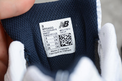 NB 530 blanco y azul marino