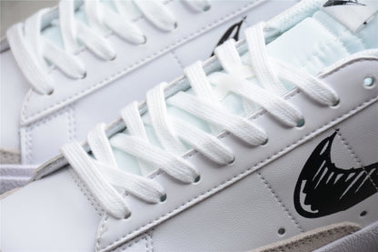 Blazer low '77 blanco y negro