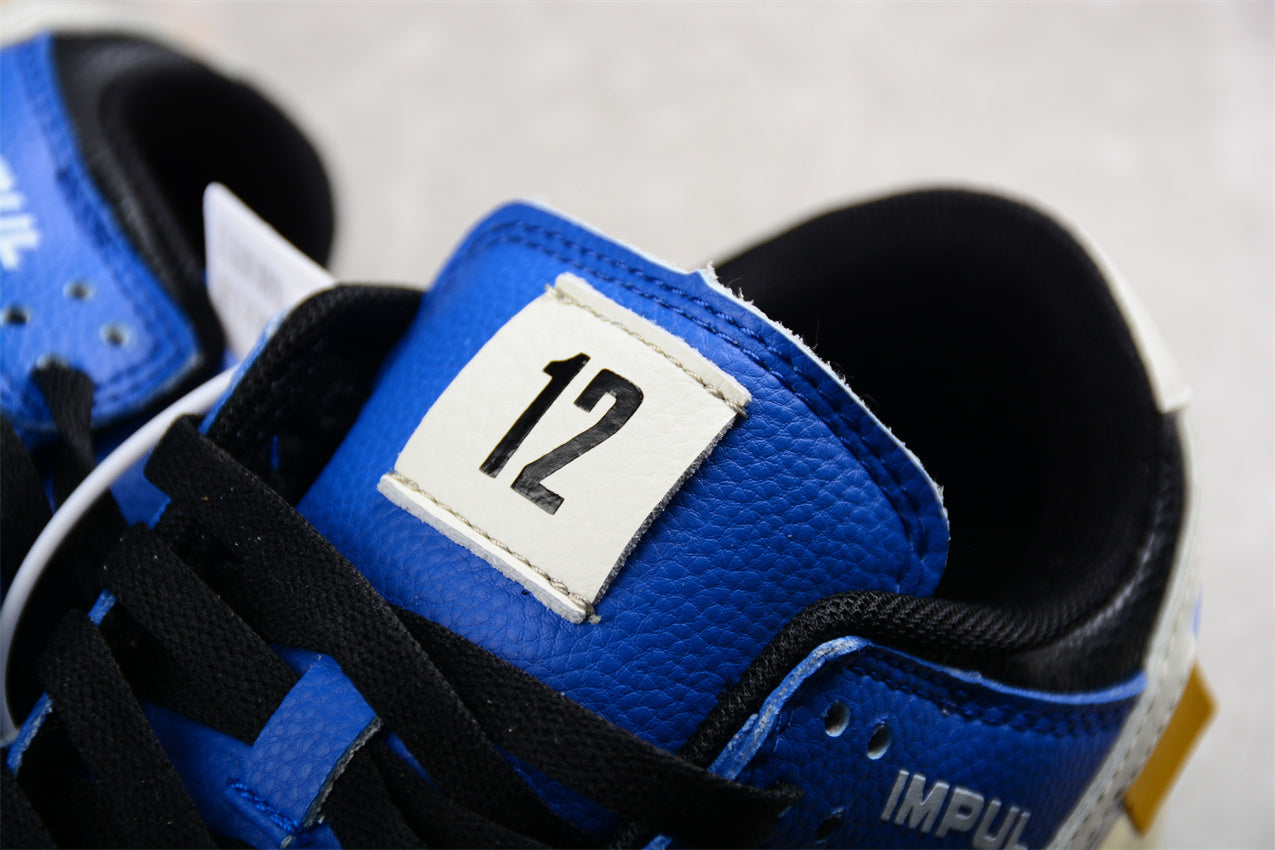 Dunk Low “Calsonic Nissan Impul” azul y blanco