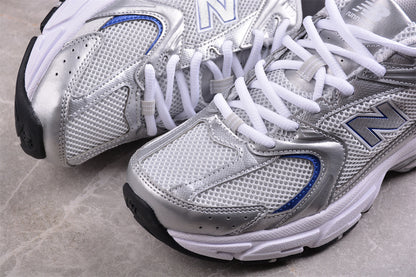 NB 530 plateado y azul