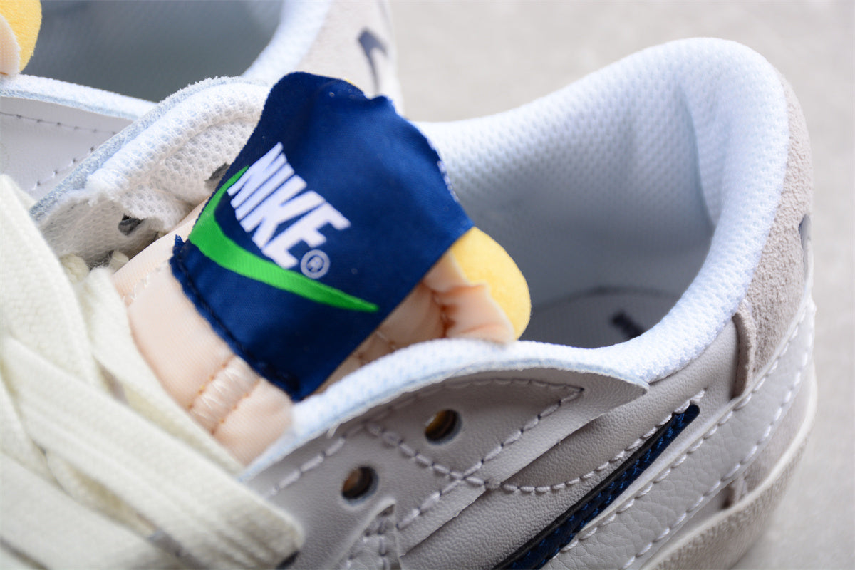 Blazer Low '77 blanco y navy