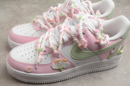 Air Force 1 Low “Cherry Blossom” rosa y verde claro