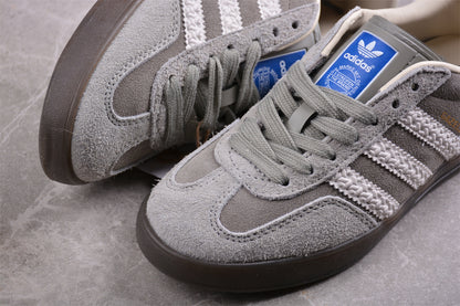 Gazelle gris y blanco