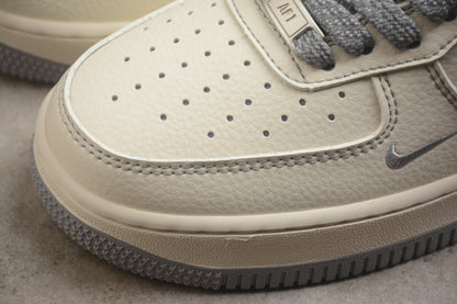 Air Force 1 Low x Stussy beige y gris