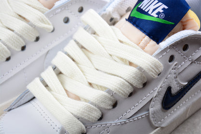 Blazer Low '77 blanco y navy