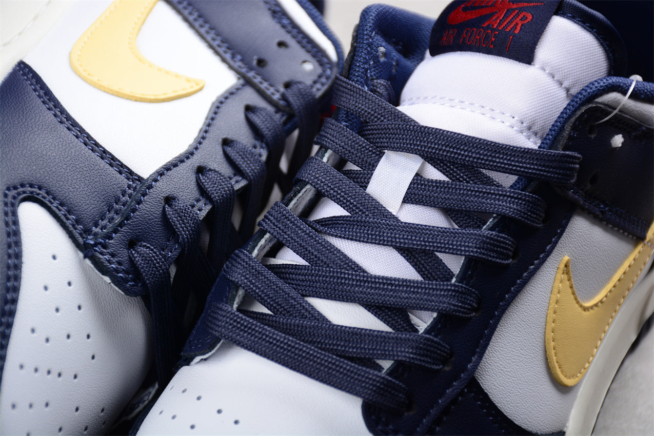 Dunk Low navy, blanco y amarillo