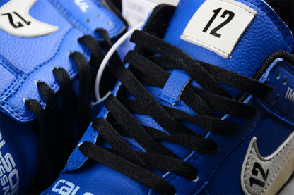 Dunk Low “Calsonic Nissan Impul” azul y blanco