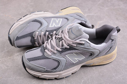 NB 530 gris con suela crema