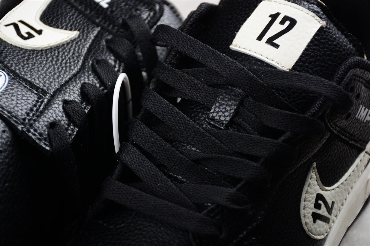 Dunk Low “Calsonic Nissan Impul” negro y blanco