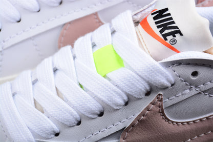 Blazer Low '77 blanco y rosa