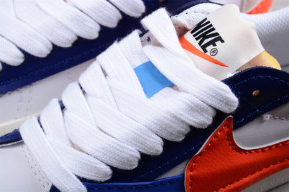 Blazer Low '77 blanco, azul y rojo