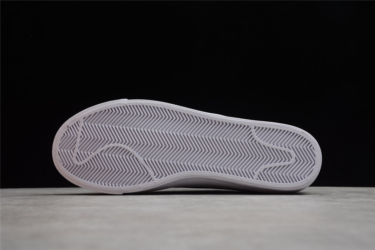 Blazer low '77 blanco y negro