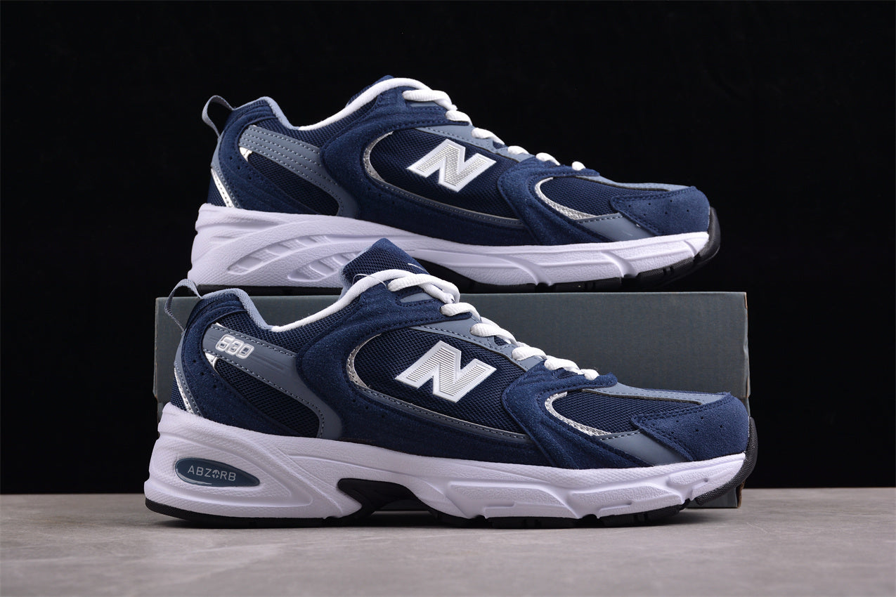 NB 530 azul marino y gris