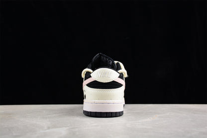 Dunk Low blanco hueso, negro y rosa