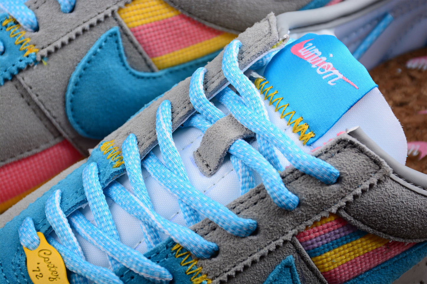 Cortez x Union LA gris, azul, amarillo y rosa