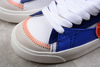 Blazer Low '77 blanco, azul y rojo
