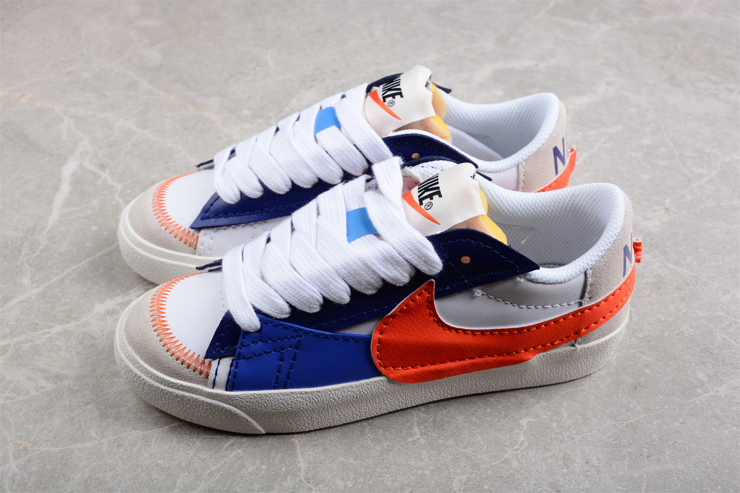 Blazer Low '77 blanco, azul y rojo