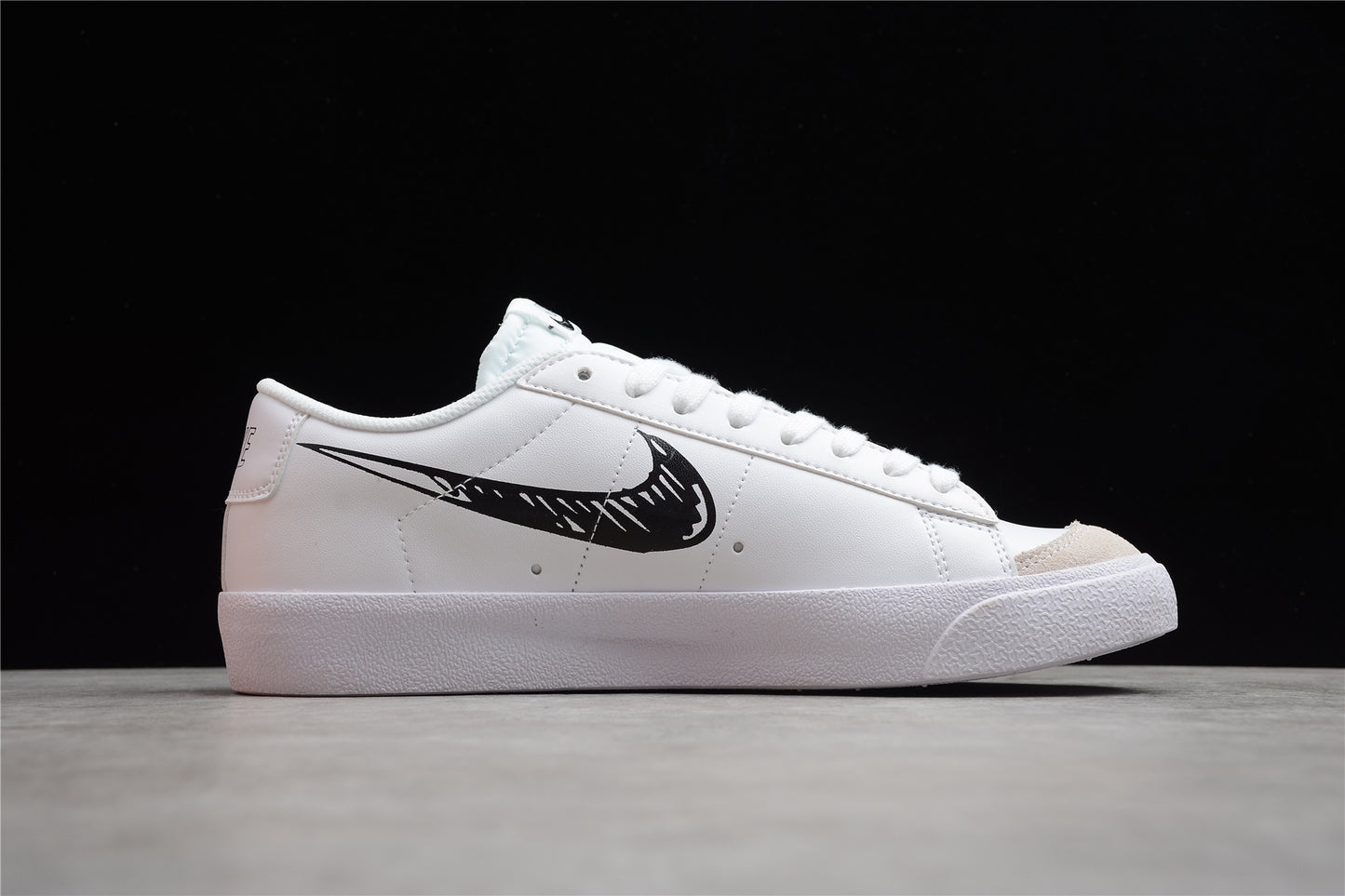 Blazer low '77 blanco y negro