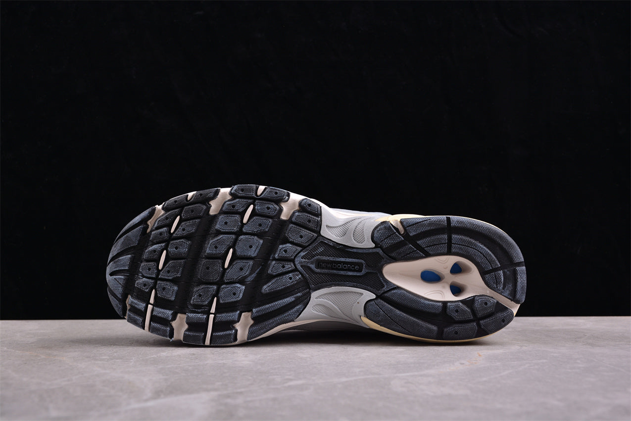 NB 530 gris con suela crema