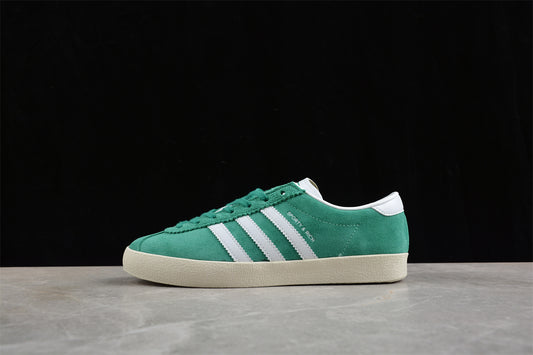 Sporty & Rich verde claro y blanco