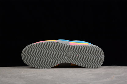 Cortez x Union LA gris, azul, amarillo y rosa