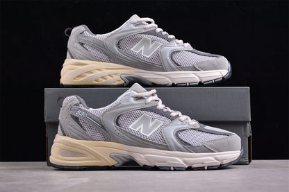 NB 530 gris con suela crema