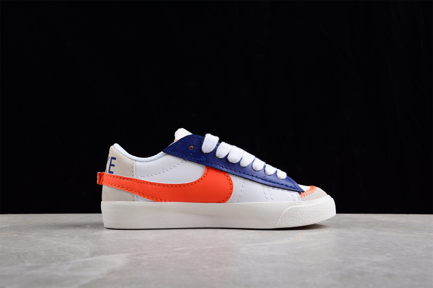 Blazer Low '77 blanco, azul y rojo