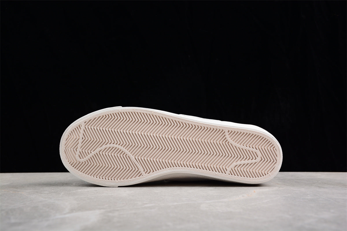 Blazer Low '77 blanco y navy