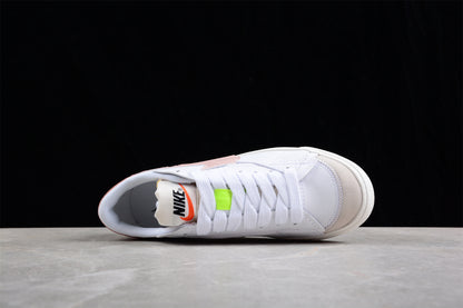 Blazer Low '77 blanco y rosa