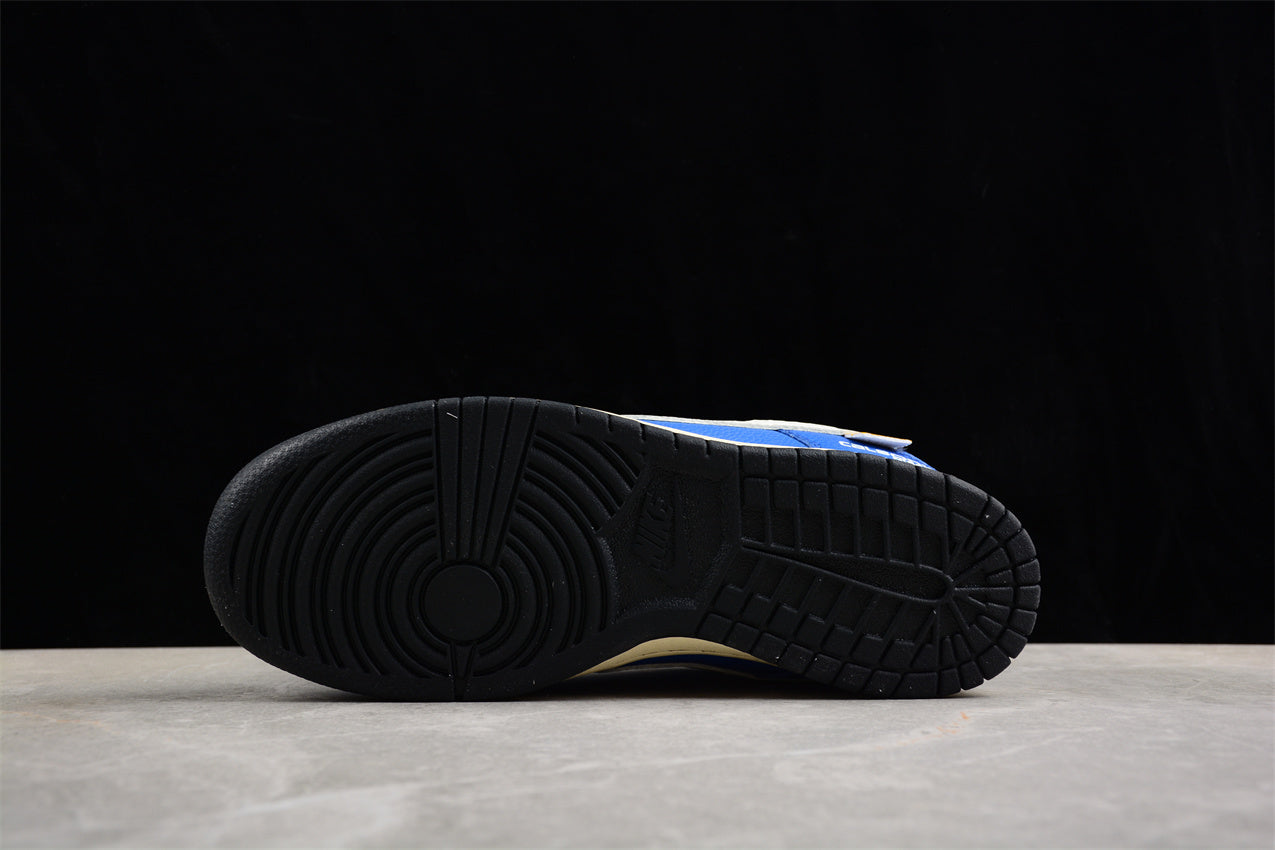 Dunk Low “Calsonic Nissan Impul” azul y blanco