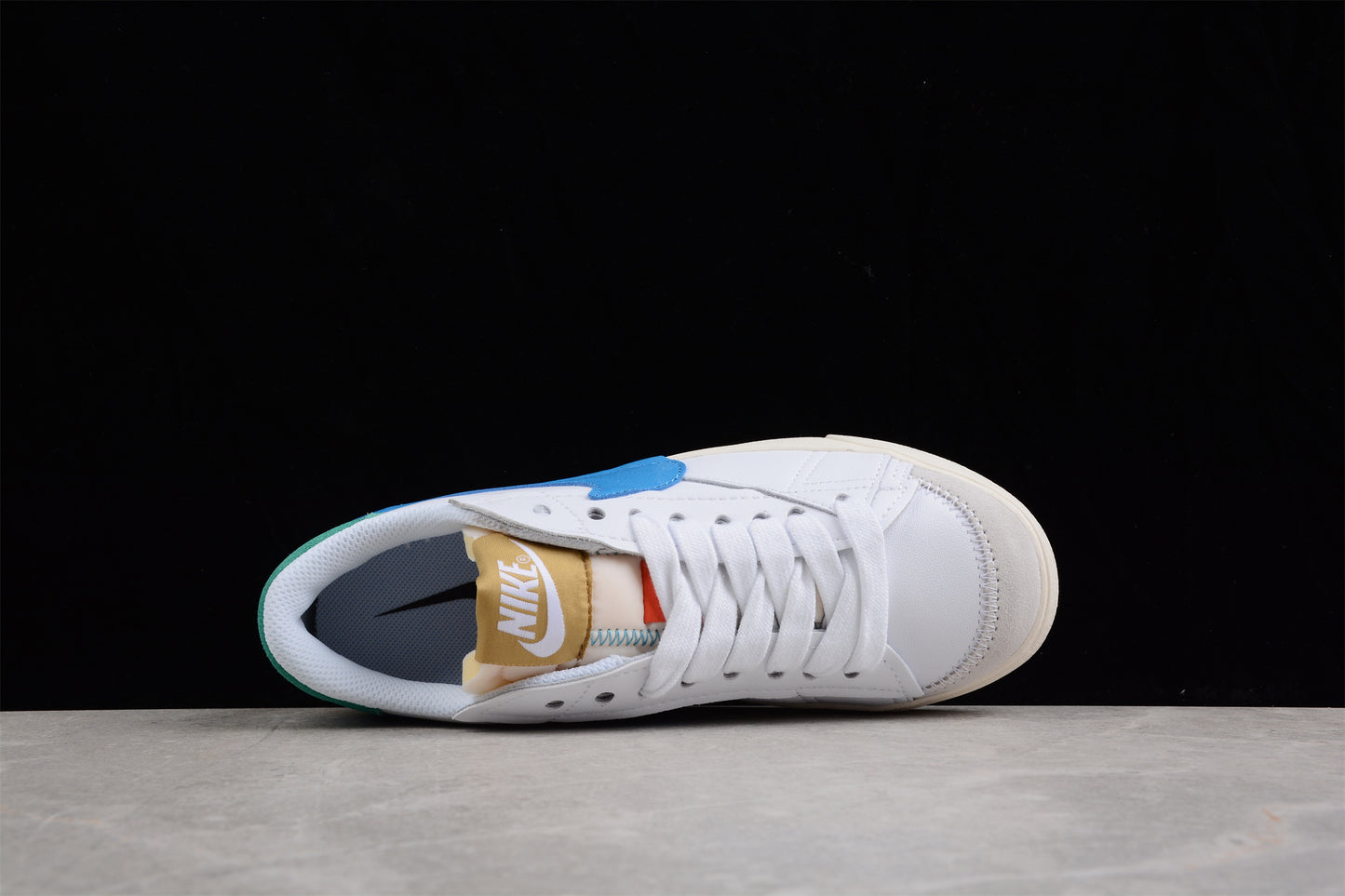Blazer Low '77 blanco, verde y azul