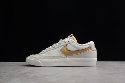 Blazer Low '77 blanco, dorado y rojo