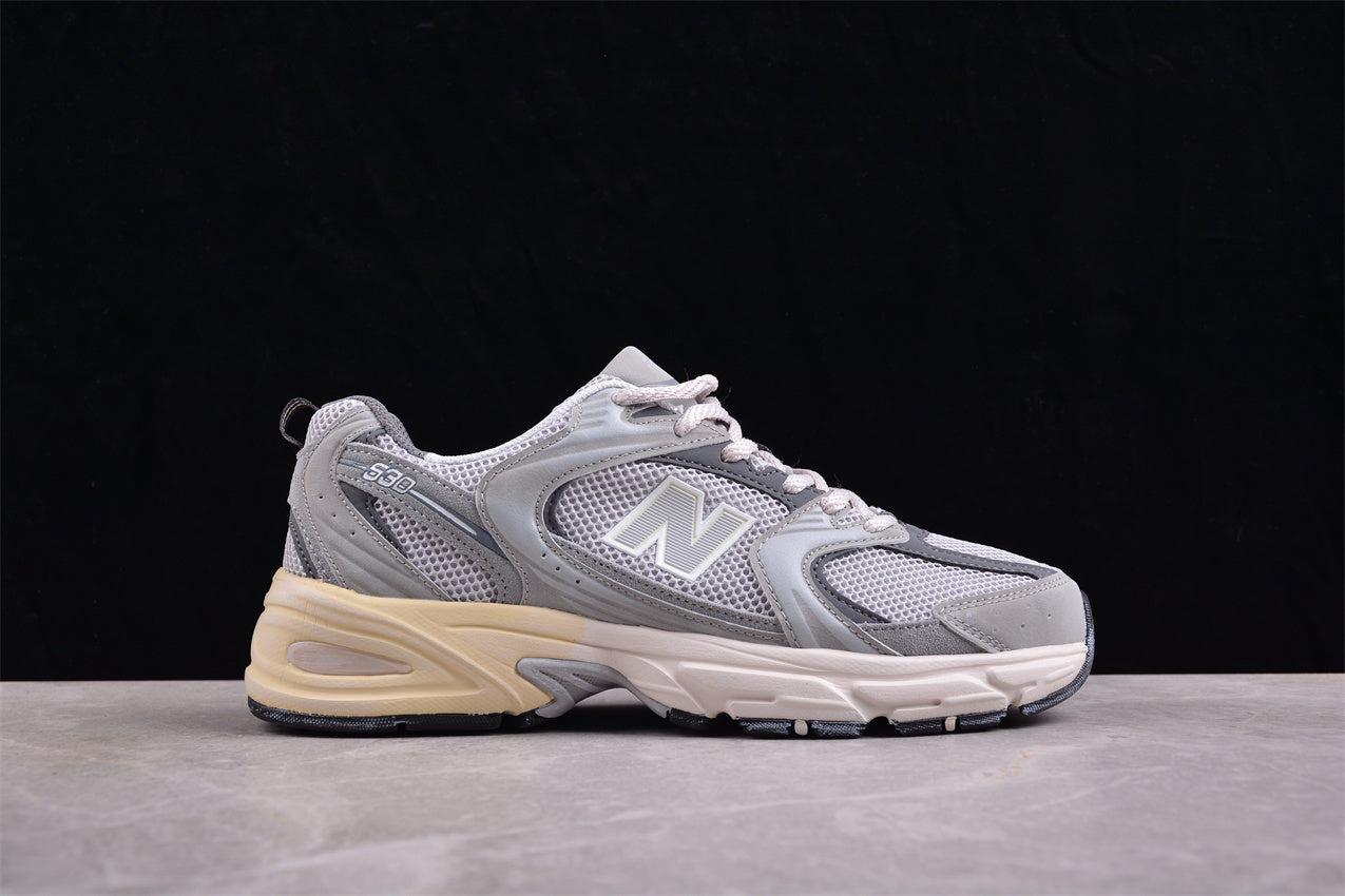 NB 530 gris con suela crema