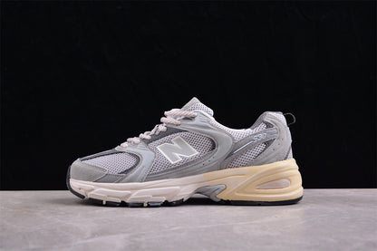 NB 530 gris con suela crema
