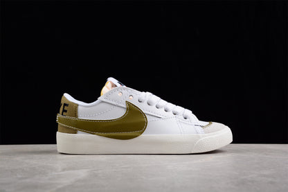 Blazer Low '77 blanco y dorado
